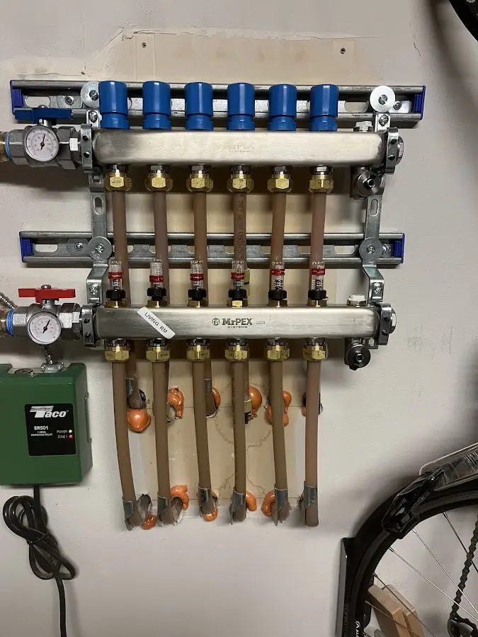 Plumber performing Gas Line Installation at a residential property in Westfall